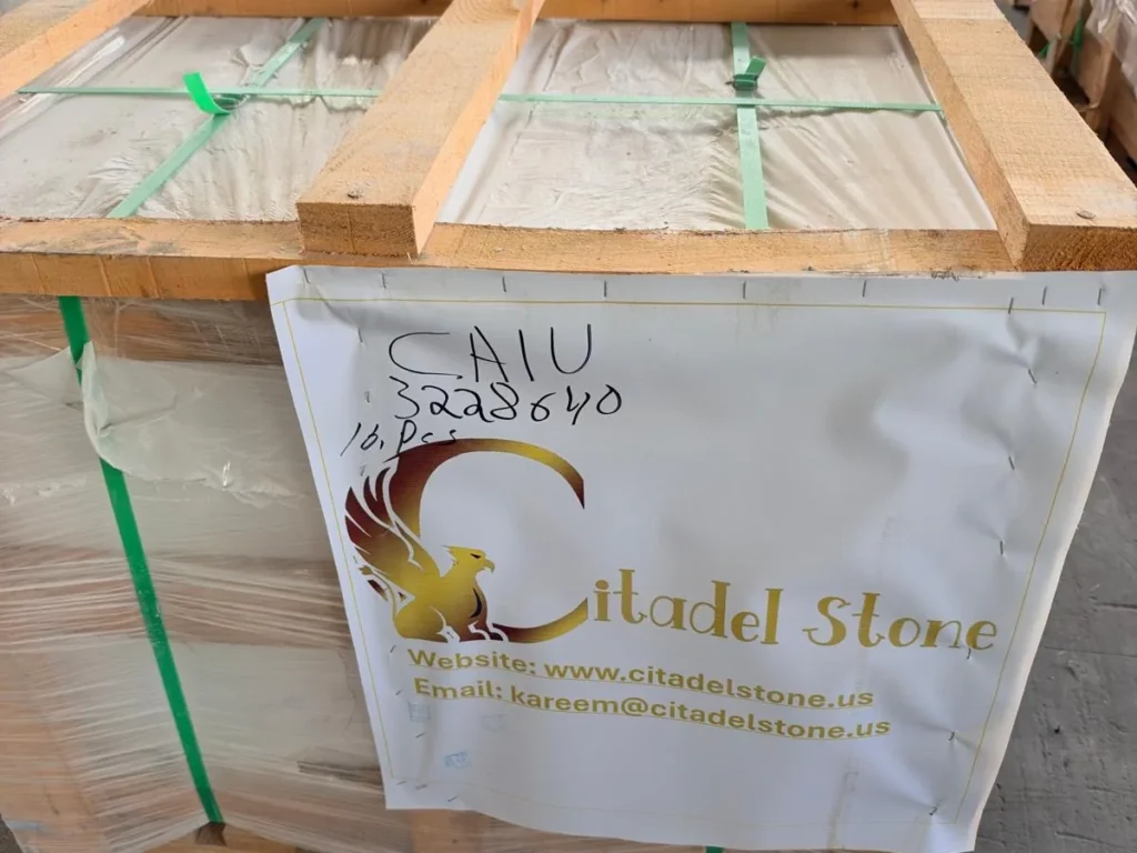 Film-wrapped crate with a Citadel Stone label marked CAIU 3228640.